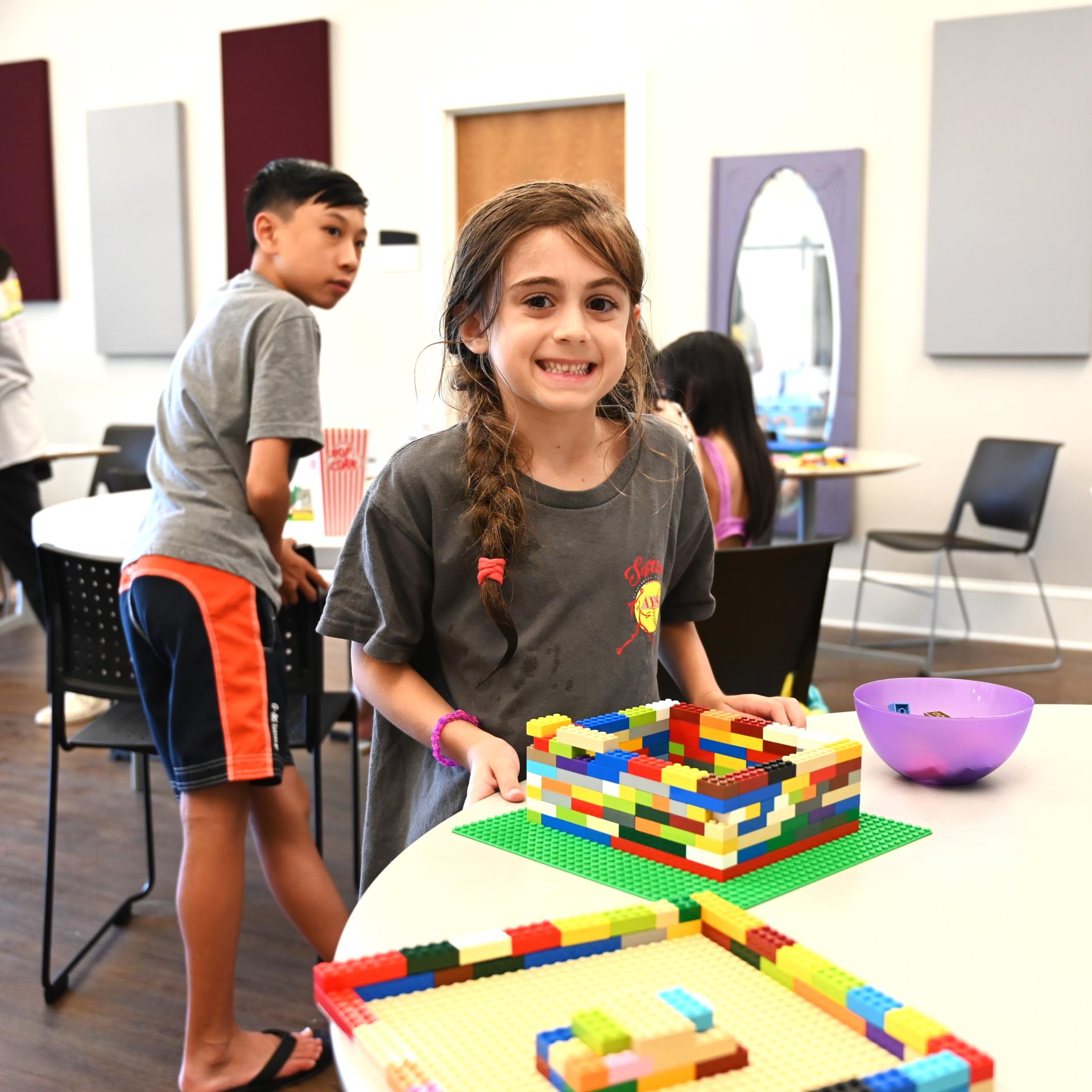 Girl playing with Legos