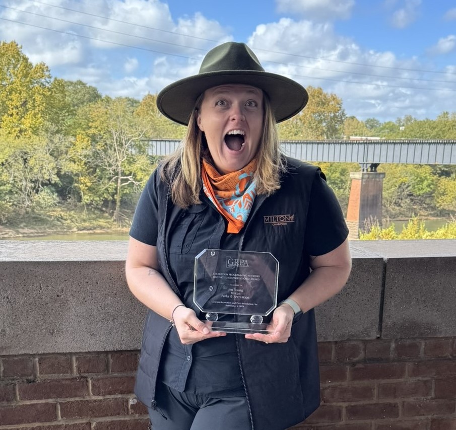 Cropped Jen holding award