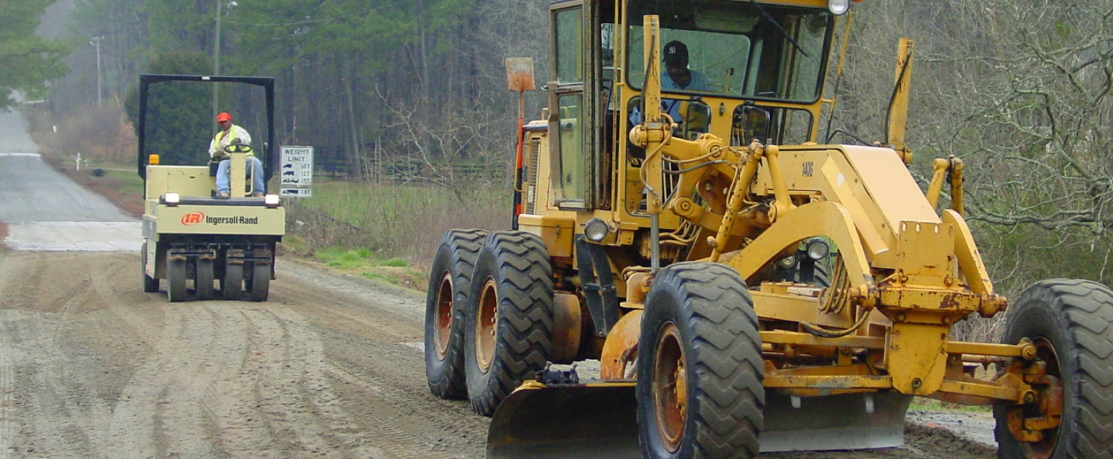 Construction equipment on an unpaved road