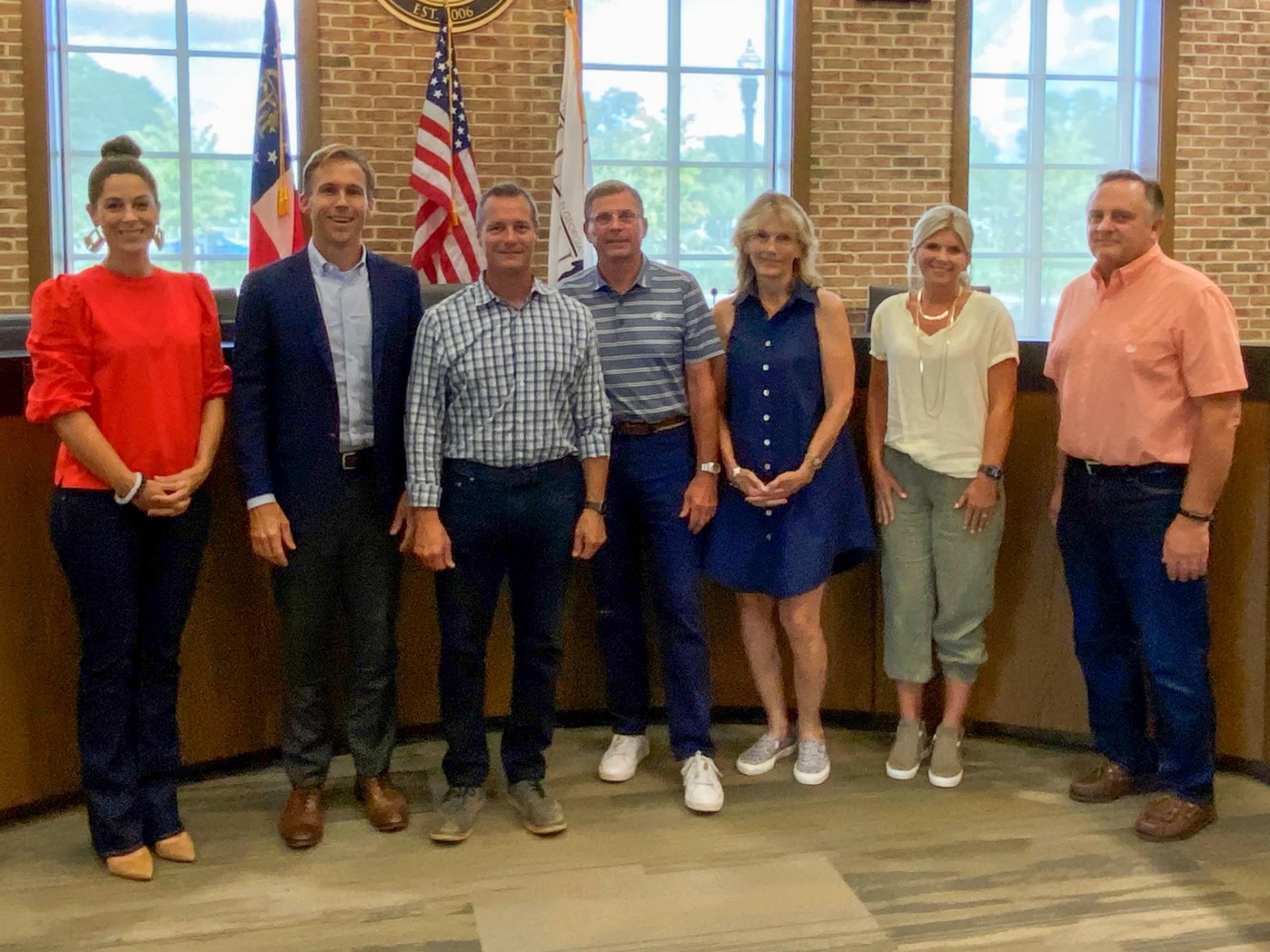 Milton City Council, Mayor and newest Planning Commission member Trey James post for photo after his swearing in, July 6, 2022