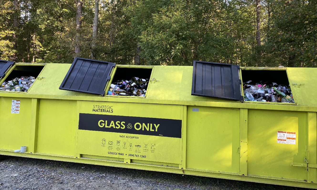 filled.glass.recycling.bin