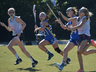 Girls playing lacrosse