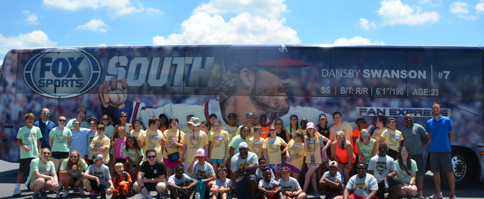 Campers in front of Fox Sports screen