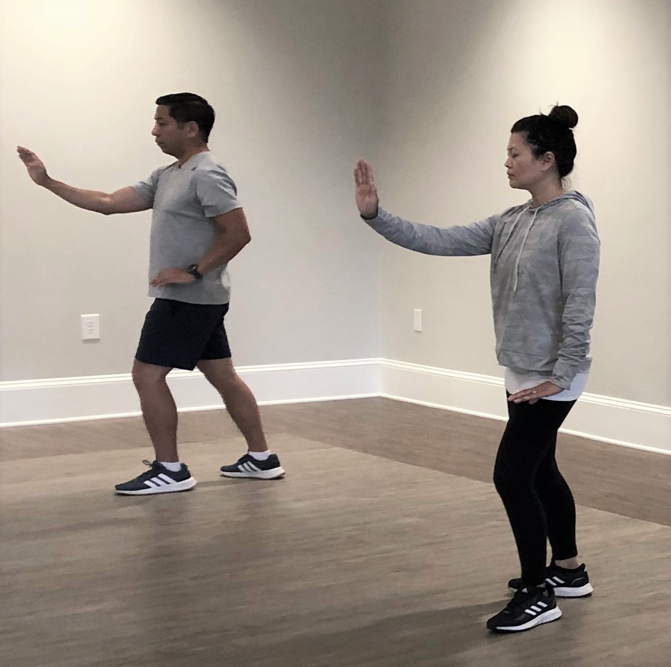 Tai Chi two instructors square