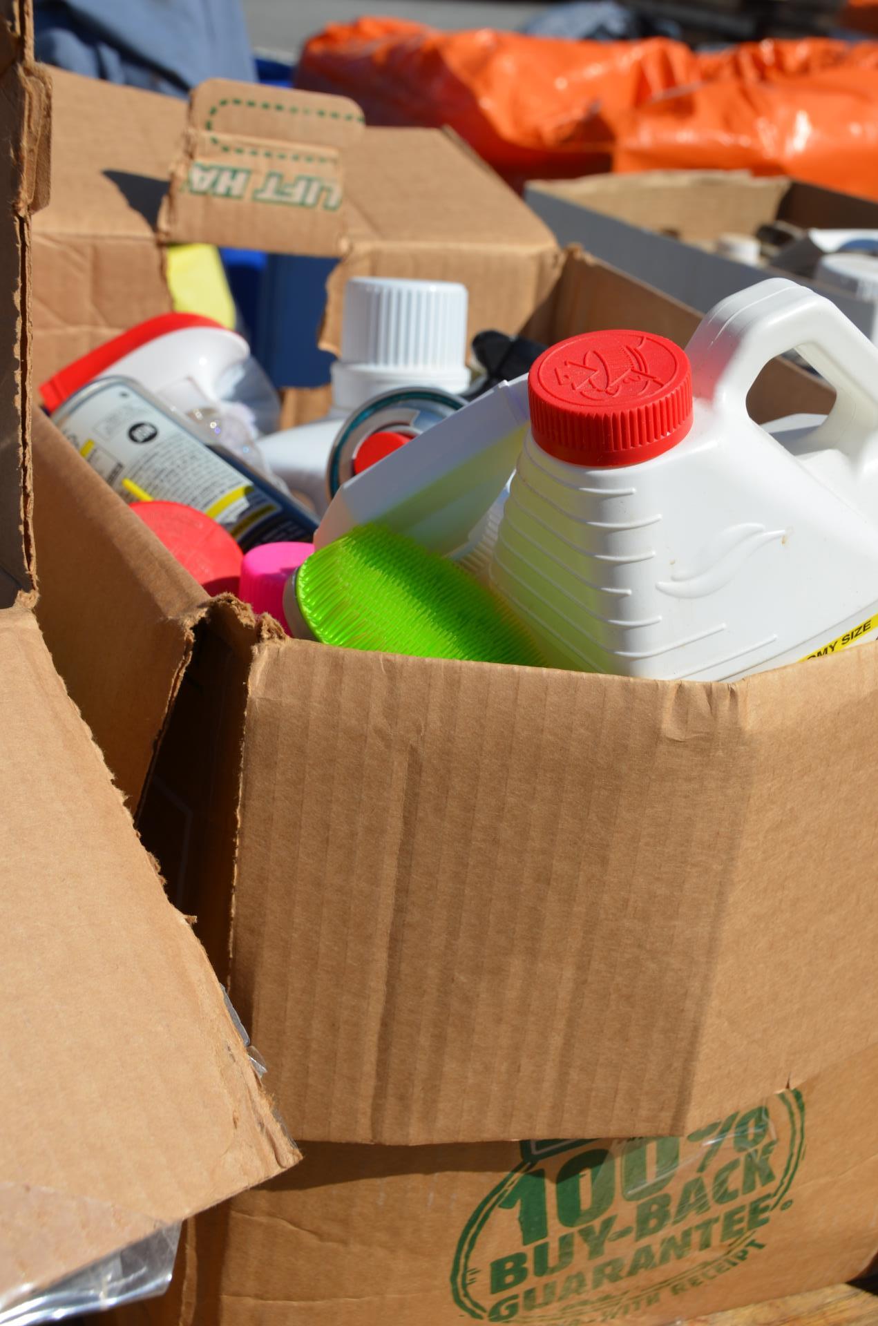 chemical containers in box