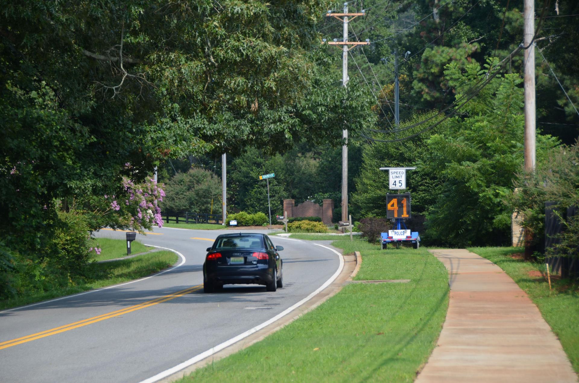 Speed Sign Thompson July 2021_License blurred