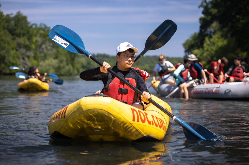 ducky paddling river