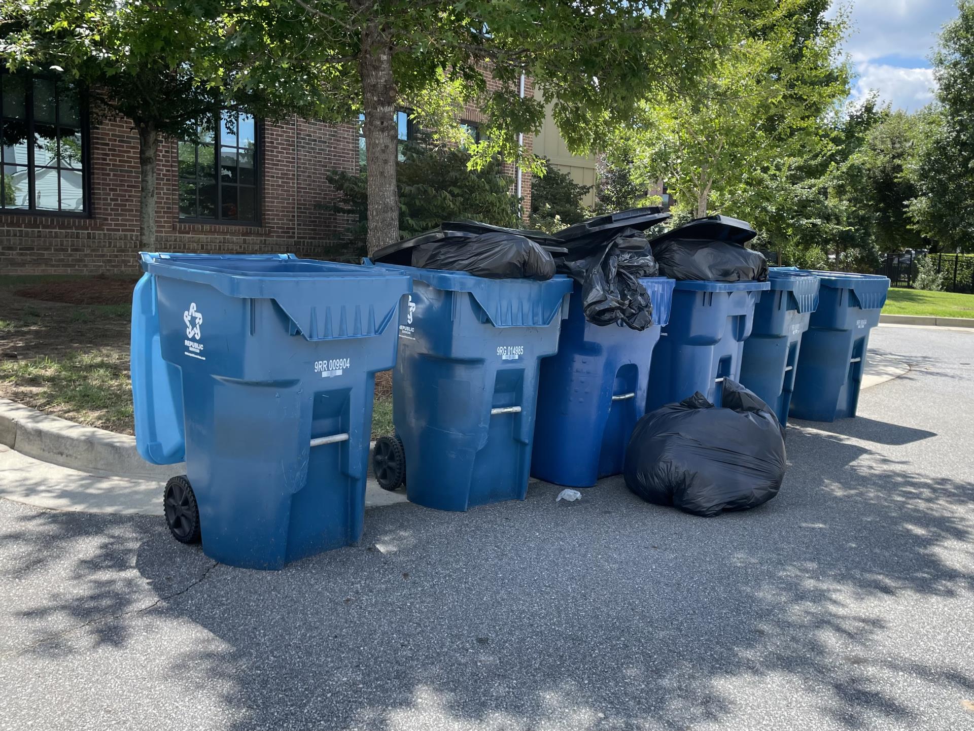 Trash and recycling barrels